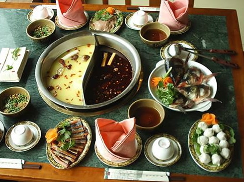 Chengdu sichual hotpot table china travel tourists famous spicy hot pot dishes