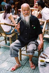 chengdu chinese man tea shop china travel tourists old man relaxing tea pipe