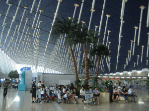 shanghai pudong airport terminal travelers waiting china