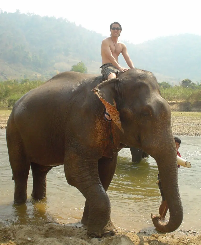 China Mike traveling on elephant