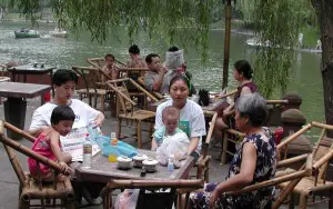 chinese family relaxing tea tourists travel