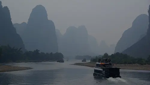 An old ferry boat sailing down the Li River