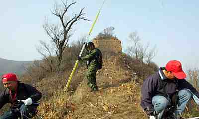 Archeologists measuring the Great Wall of China