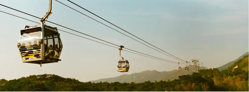 People riding a scenic chair lift