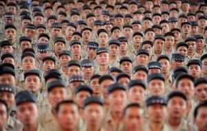 A large Chinese crowd in uniform