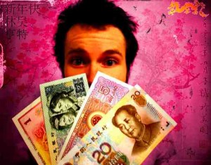 A man holding Renminbi bills