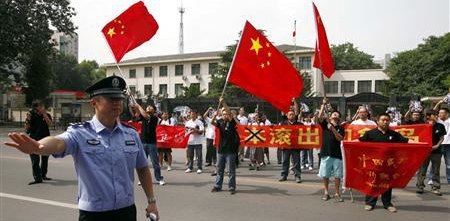 Chinese man directing people