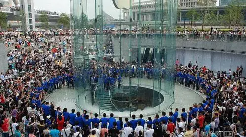 A crowd gathered around an Apple retail store in Shanghai.